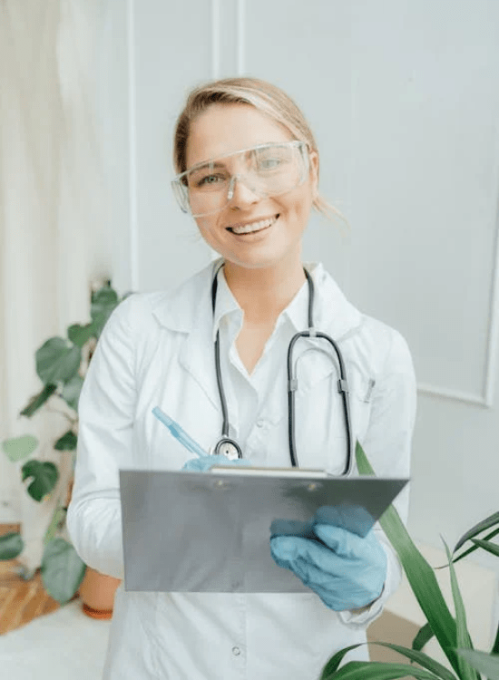 Doctor with writing pad taking notes